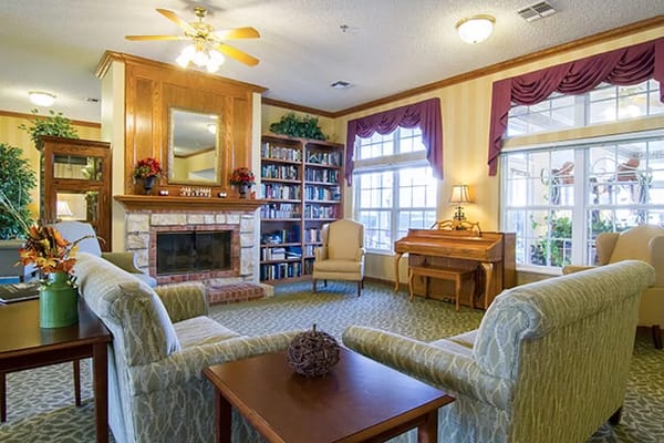 Cozy common area with seating and a fireplace