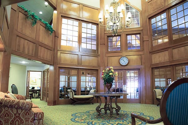 Interior of a cozy common area with wooden decor
