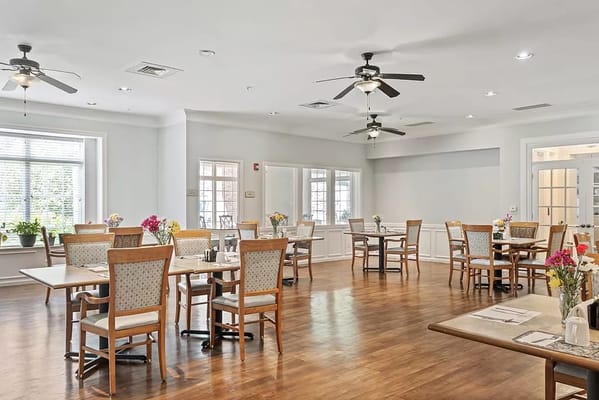 Dining area with tables and flowers
