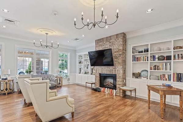 Interior common area with seating and fireplace