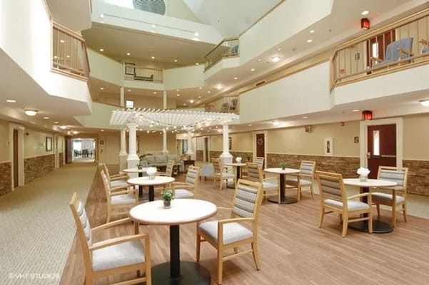 Bright common area with seating and decor