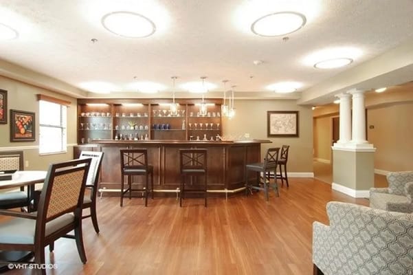 Common area with a bar and seating