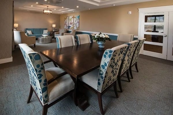 Interior of a common area with dining table and chairs