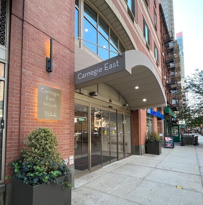 Entrance of Carnegie East House with signage