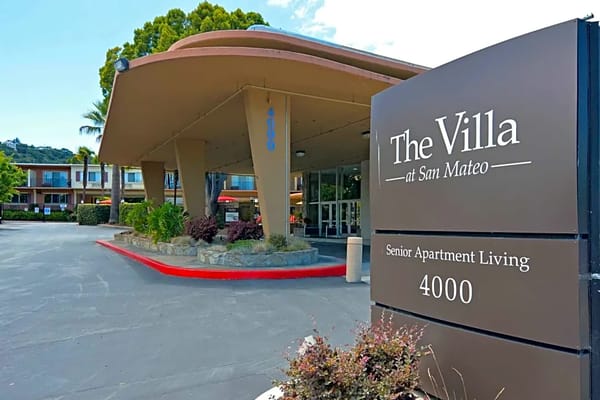 Entrance sign of The Villa at San Mateo senior living facility