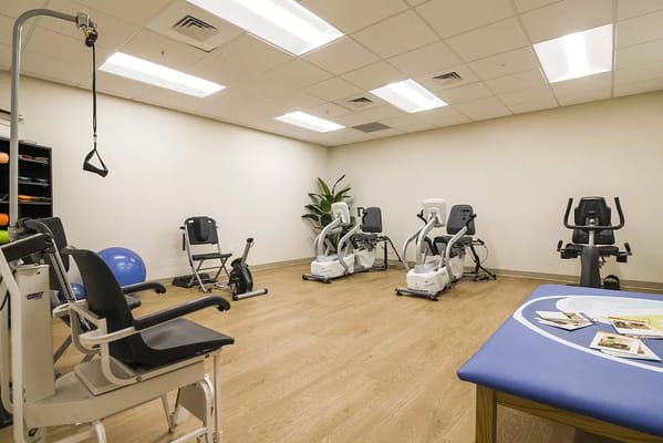 Interior of a therapy room with exercise equipment
