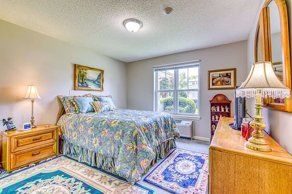 Cozy senior living bedroom with floral decor
