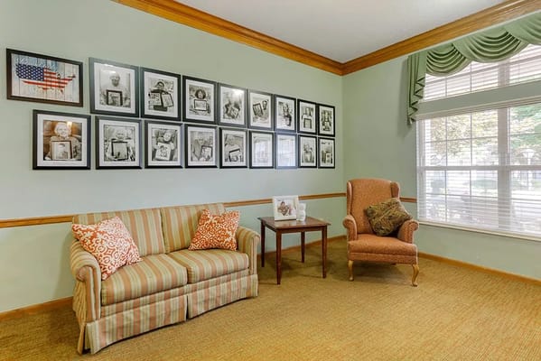 Cozy community lounge area with framed photos