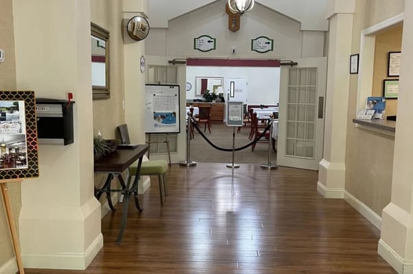 View of the lobby entrance leading to a dining area at Cloudberry Lodge.