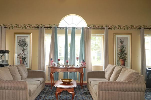 Cozy living room with two sofas and decorative items