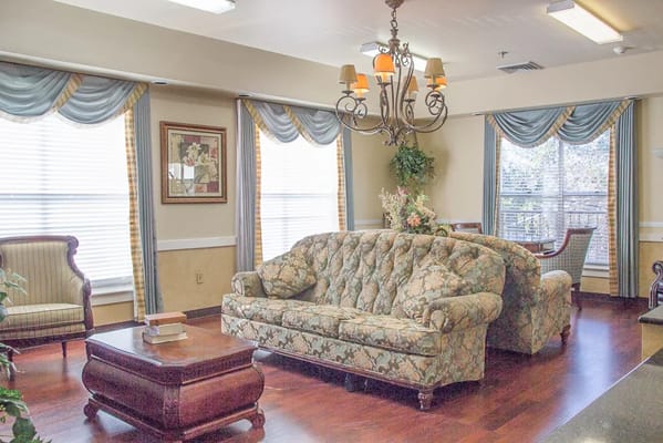Comfortable common area with seating and natural light