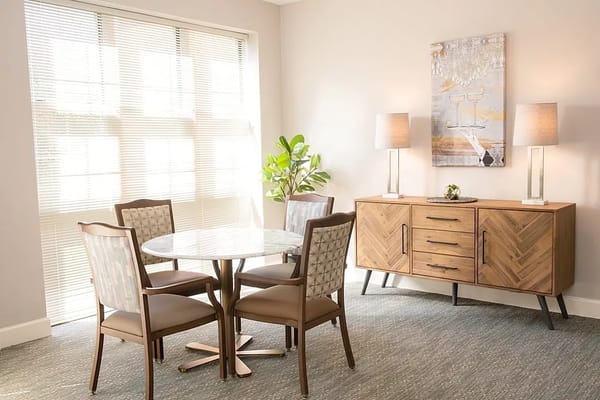 Cozy interior dining area with a round table and decorative elements