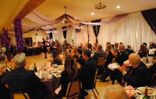 Residents attending a lively event in a common area