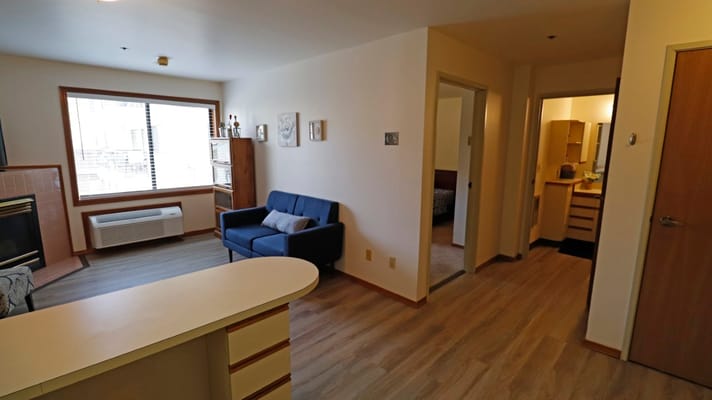 Cozy interior of a resident room with seating area