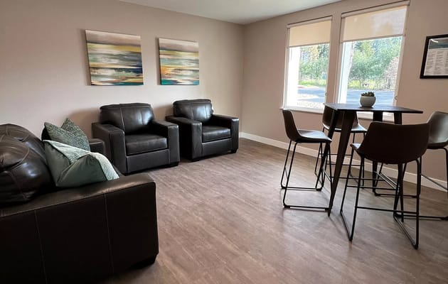 A common area with seating and natural light