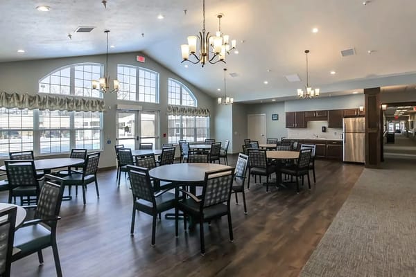 Spacious dining area with tables and chairs