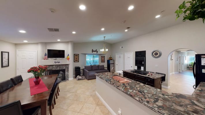 Interior view of a cozy common area with seating and decor