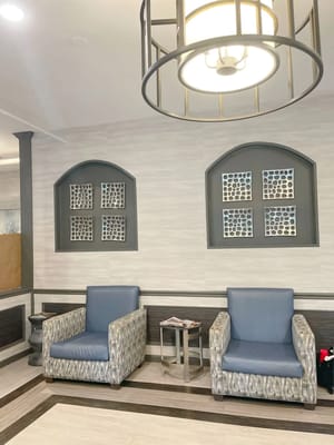 Interior view of a cozy lounge area with chairs