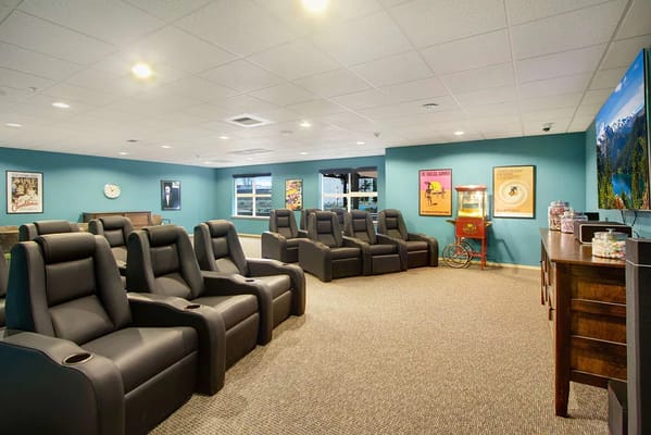 Comfortable seating in a facility's movie room