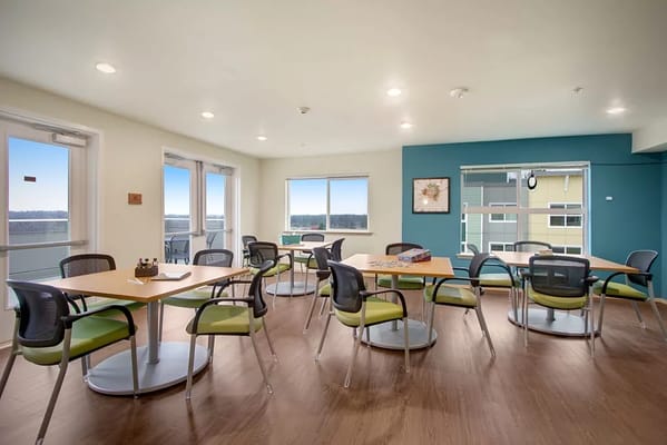 Interior common area with tables and chairs