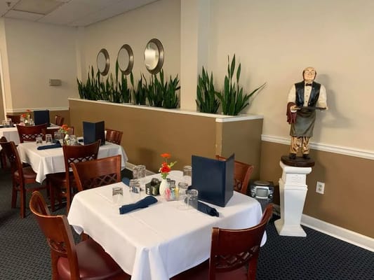 Cozy dining area with tables set for meals