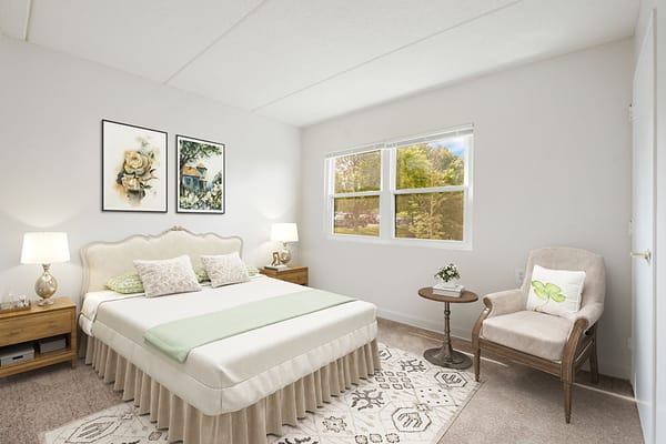 A well-decorated resident bedroom with natural light