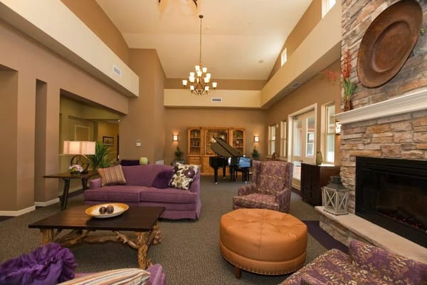 Interior lounge area with seating and a piano