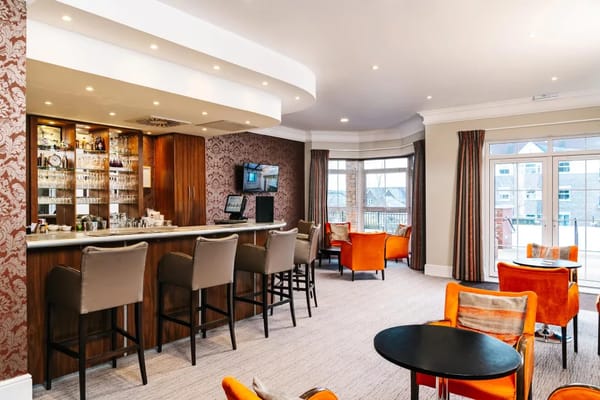 Bright common area with bar and seating