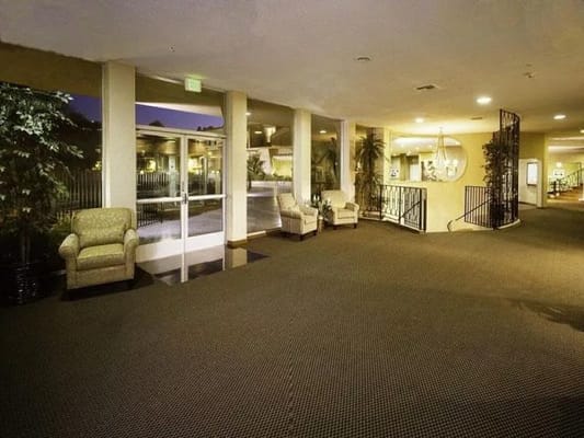 Welcoming lobby with seating and decorative plants