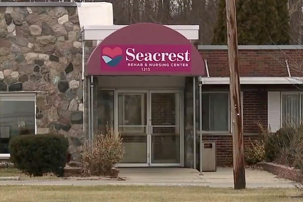 Entrance of Seacrest Rehabilitation and Nursing Center with stone facade