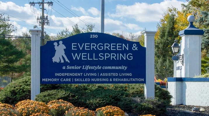 Sign for Evergreen & Wellspring Senior Lifestyle community