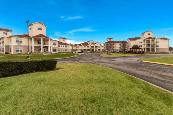 Entrance and exterior of Fieldstone Place senior living facility