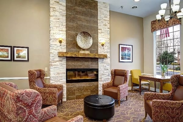 Cozy common area with seating and a fireplace