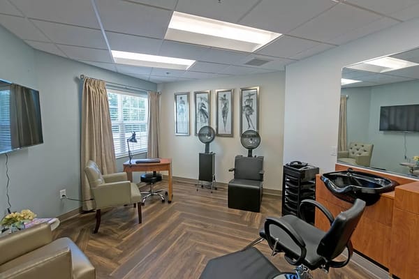 Beauty salon interior with styling chairs and mirrors