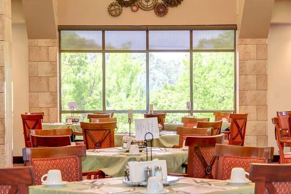 Dining area with tables set for a meal