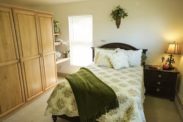 Cozy resident bedroom with natural light