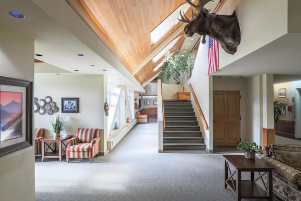 Interior view of a community area with wooden accents