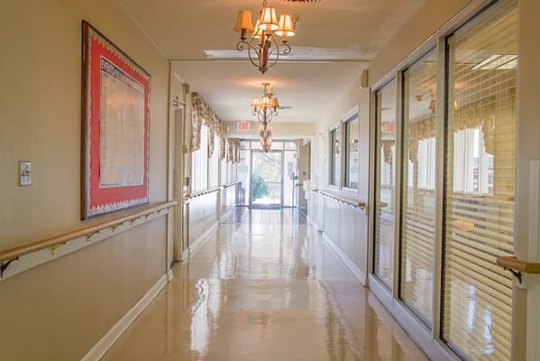 Bright hallway with decorative lighting and windows