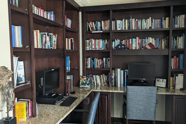 Interior study space with bookshelves and computers