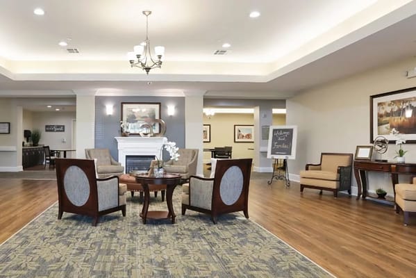 Common area with seating and a fireplace