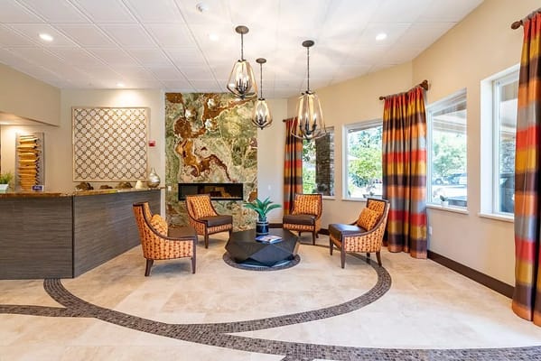 Bright common area with seating and modern decor