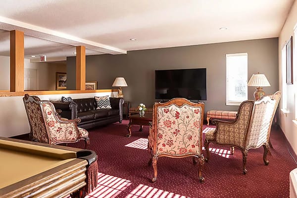 Common area with seating and a television