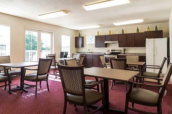 Bright dining room with tables and chairs