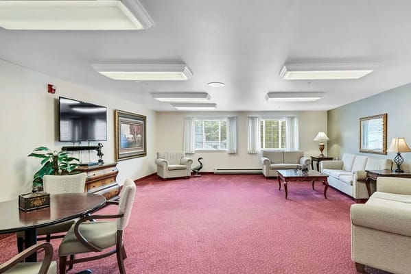 Bright common area with seating and decorative elements