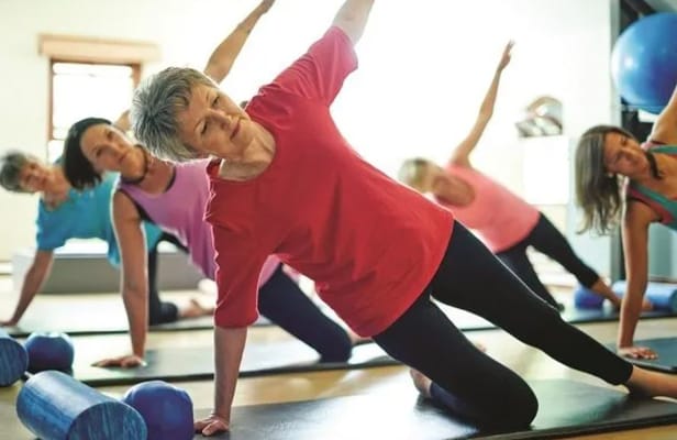 Residents participating in a group exercise class