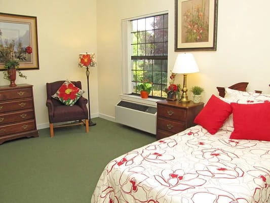 Cozy private resident room with floral decor