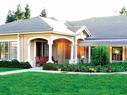 Exterior view of the facility with landscaped garden