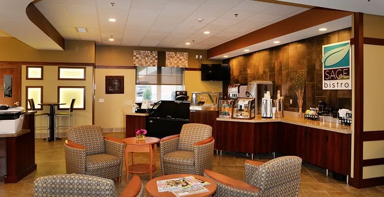 Cozy seating area in the Sage Bistro with coffee and snacks
