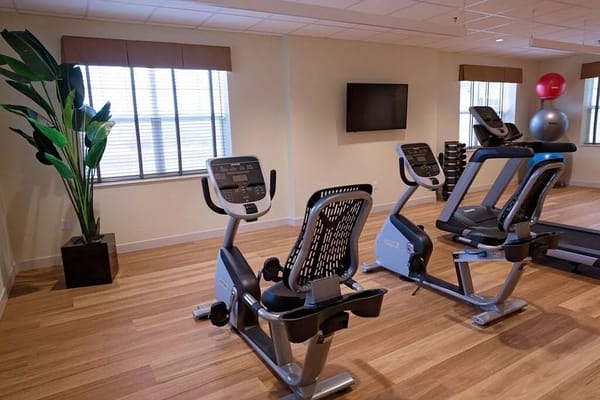 Interior view of a fitness area with exercise equipment