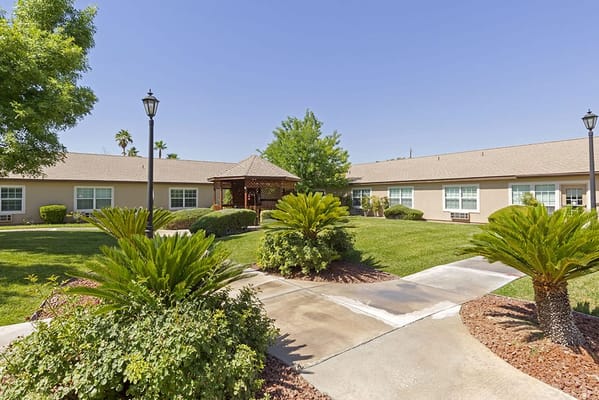 Well-maintained outdoor space with pathways and greenery
